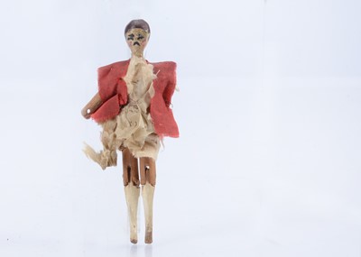 Lot 528 - An early 19th century Grodnertal wooden dolls’ house doll
