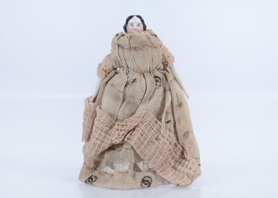 Lot 529 - A fine mid 19th century china dolls’ house doll