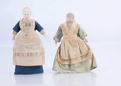 Lot 532 - Two bisque dolls’ house dolls dressed as a housekeeper and maid