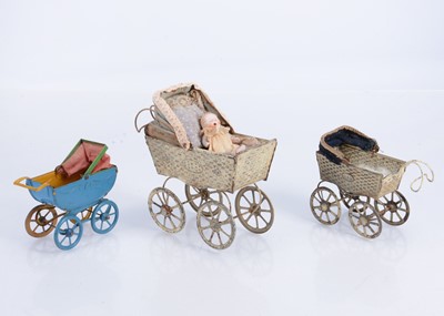Lot 534 - Two German late 19th century dolls’ house tinplate perambulators