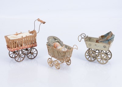 Lot 536 - Three 19th century dolls’ house perambulators