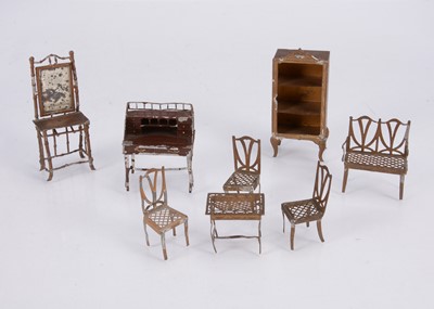 Lot 544 - Early 20th century German soft metal  small scale dolls’ house furniture