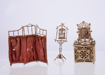 Lot 555 - Late 19th or early 20th century German soft metal dolls’ house furniture