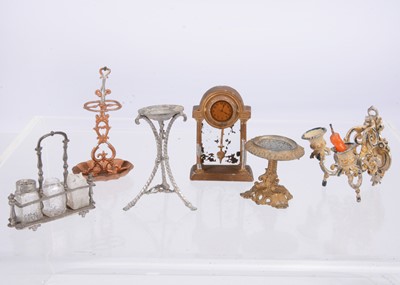 Lot 556 - Late 19th or early 20th century German cast-metal dolls’ house chattels
