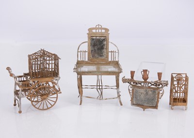 Lot 559 - 1900-1920 German soft metal dolls’ house furniture