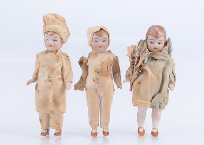 Lot 569 - Three all-bisque character child dolls’ house dolls