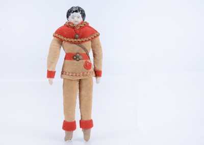 Lot 575 - An 19th century china shoulder-head dolls’ house doll