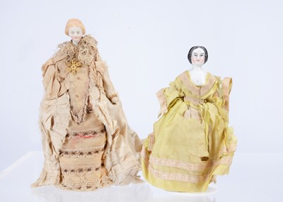 Lot 584 - Two 19th century German shoulder-head dolls’ house dolls