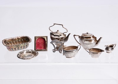 Lot 594 - Silver dolls’ house pieces 1900-1920s