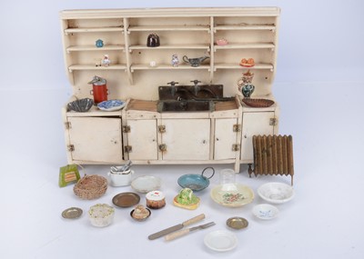 Lot 610 - A large scale dolls’ house kitchen unit