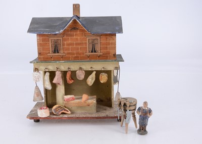 Lot 613 - A small early 20th century wooden butcher’s shop from the Floral Jill Jacobs collection