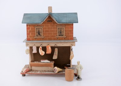 Lot 614 - A small early 20th century wooden butcher’s shop