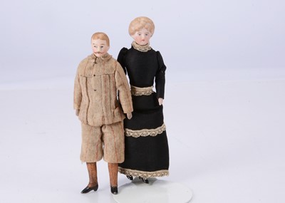 Lot 624 - Two German bisque shoulder-head dolls’ house dolls