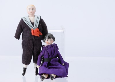 Lot 632 - A German good quality bisque shoulder-head dolls’ house boy doll