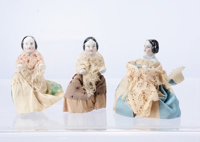 Lot 634 - Two German pink tinted china Frozen Charlottes