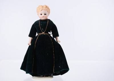 Lot 635 - An 19th century Alt, Beck & Gottschalck bisque shoulder-head dolls’ house doll