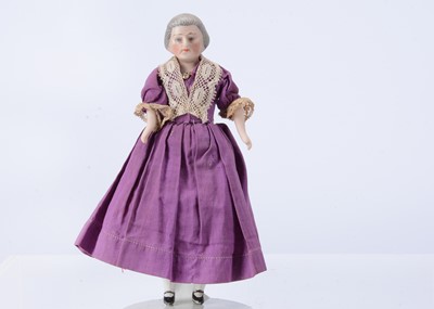 Lot 637 - A rare early 20th century bisque shoulder-head 487 larger size elder lady dolls’ house doll