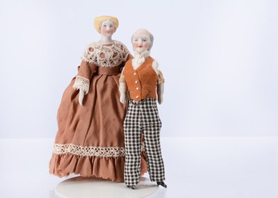 Lot 652 - 19th century German bisque shoulder-head lady and gentleman dolls’ house dolls
