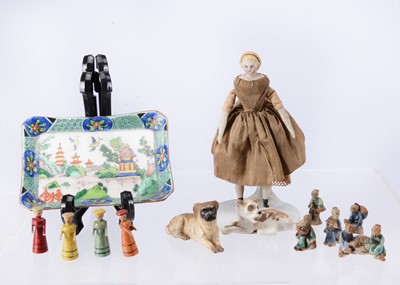 Lot 654 - A fine quality 19th century bisque shoulder-head dolls’ house doll