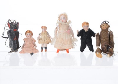 Lot 665 - An all-bisque Lilliputian dolls’ house doll