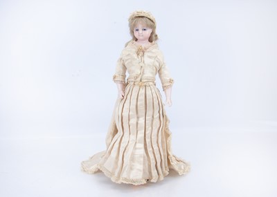 Lot 668 - An 19th century F. Aldis (England) poured wax child doll