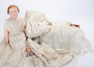 Lot 674 - A rare large 19th century English poured wax baby doll with weighted sleeping eyes