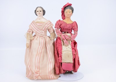 Lot 678 - Two 19th century German papier-mâché dolls