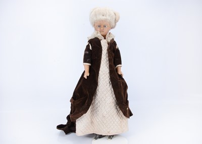 Lot 683 - A late 19th century German wax over composition lady doll