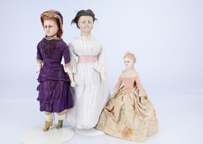 Lot 689 - Three 19th century German wax over composition lady dolls