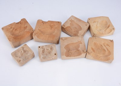 Lot 713 - Four late 19th century carved wooden animal butter moulds