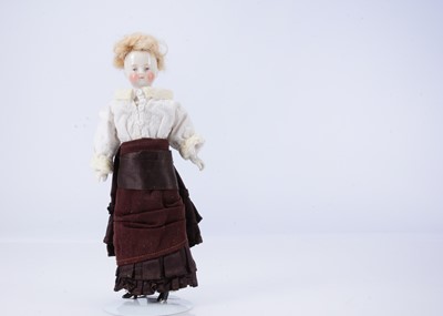 Lot 744 - A fine small 19th century glazed china shoulder head doll