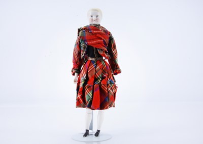 Lot 746 - A mid 19th century bisque shoulder-head boy doll