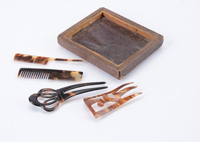 Lot 761 - Two 19th century French fashion doll’s tortoiseshell hair combs