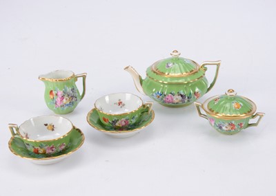 Lot 764 - A late 19th century continental porcelain doll’s tea for two