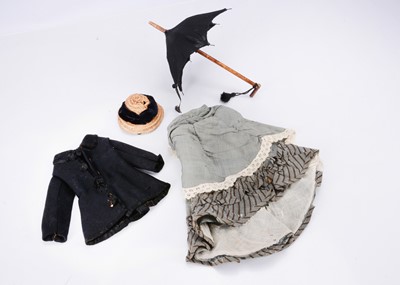 Lot 769 - A two piece fashion doll’s outfit with accessories