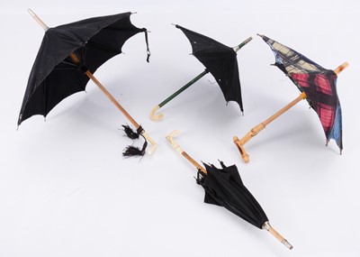 Lot 775 - Four doll’s umbrellas