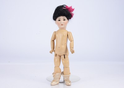 Lot 792 - A fine quality Simon & Halbig 1329 tinted Asian child doll