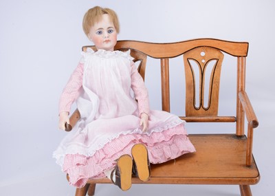 Lot 823 - A German solid-dome should-head swivel neck doll