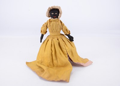 Lot 844 - A late 19th century hand-stitched black and white cloth topsy-turvy doll