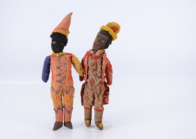 Lot 850 - A pair of late 19th century hand-stitched black clowns