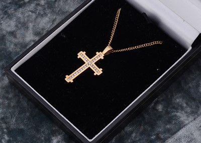 Lot 6 - A 9ct gold diamond set celebration cross