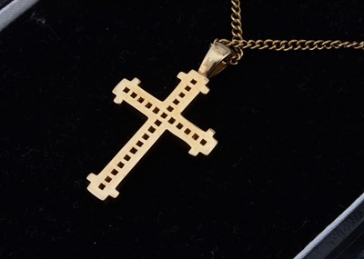 Lot 6 - A 9ct gold diamond set celebration cross