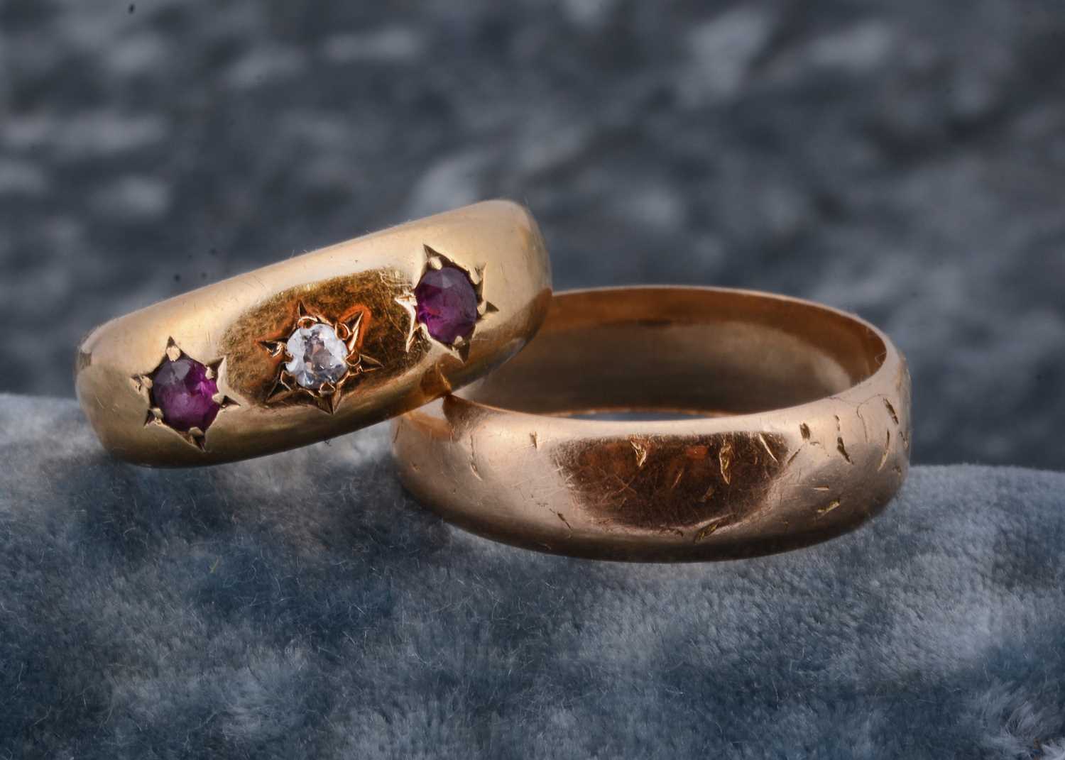 Lot 15 - A Victorian three stone ruby and diamond 18ct gold dress ring