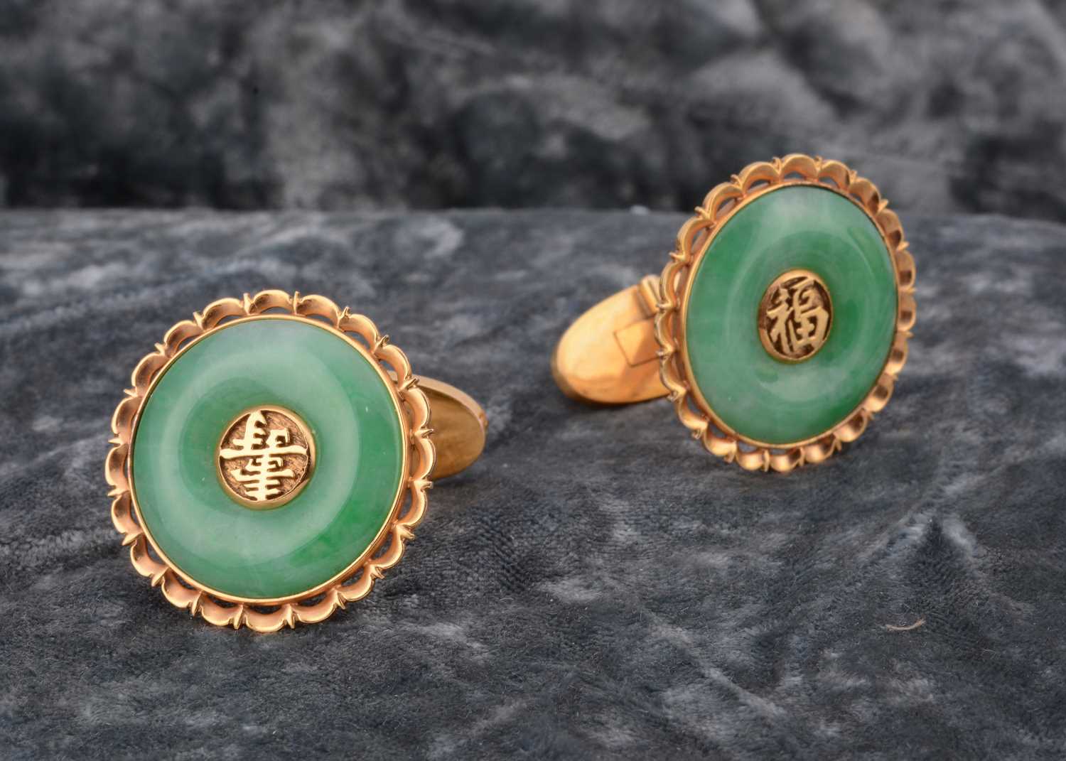 Lot 27 - A pair of continental 14k marked gentleman's jadeite jade cufflinks