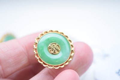 Lot 27 - A pair of continental 14k marked gentleman's jadeite jade cufflinks