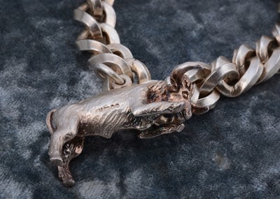 Lot 45 - A silver curb link bracelet with padlock clasp