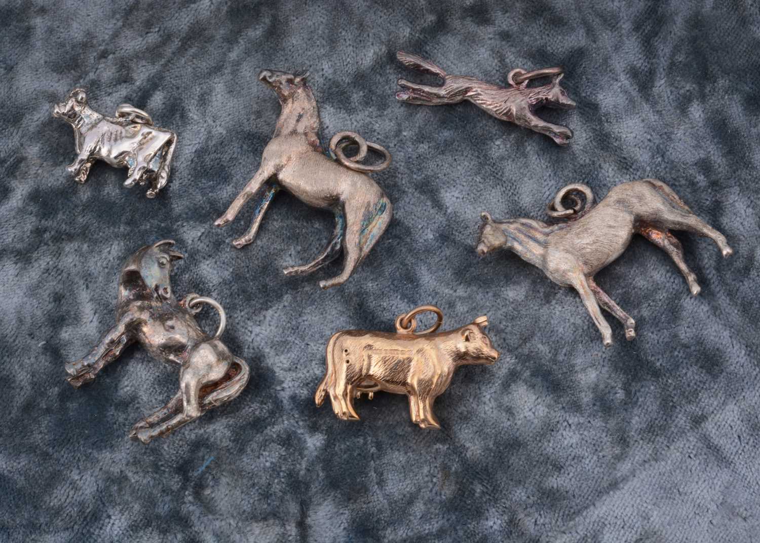 Lot 46 - A 9ct gold bull charm