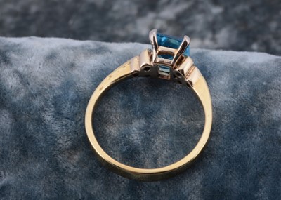 Lot 55 - An 18ct gold continental topaz and diamond dress ring