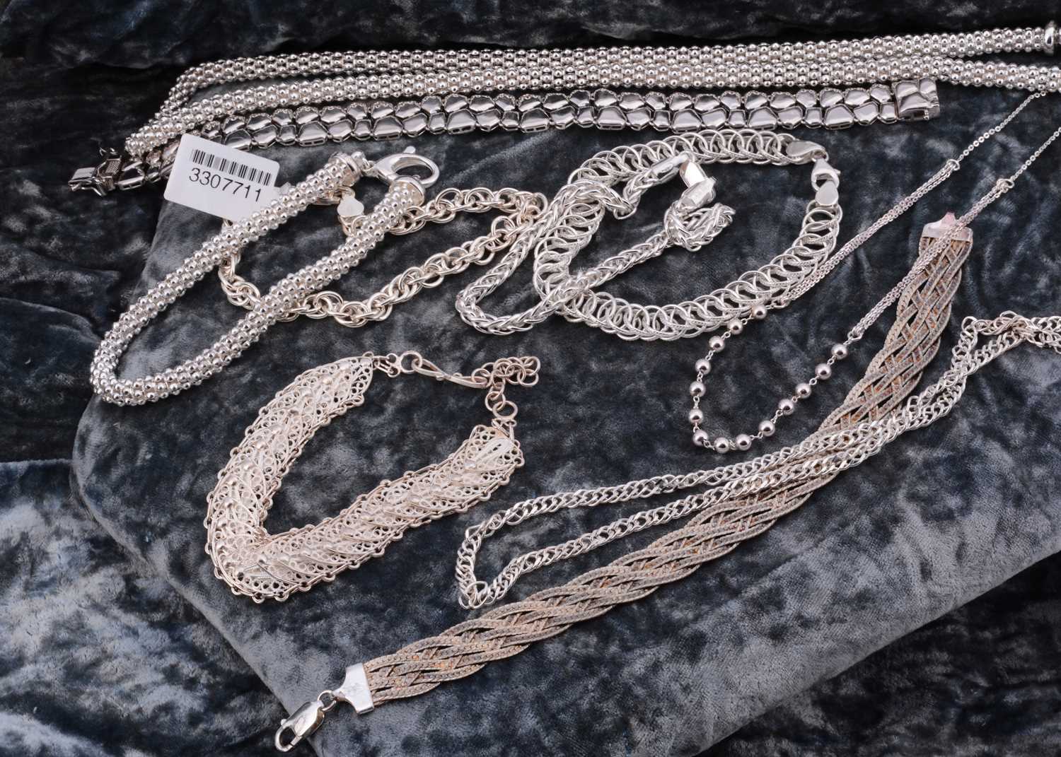 Lot 59 - A collection of silver bracelets and necklaces