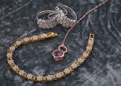 Lot 62 - A silver gilt and gem set bracelet